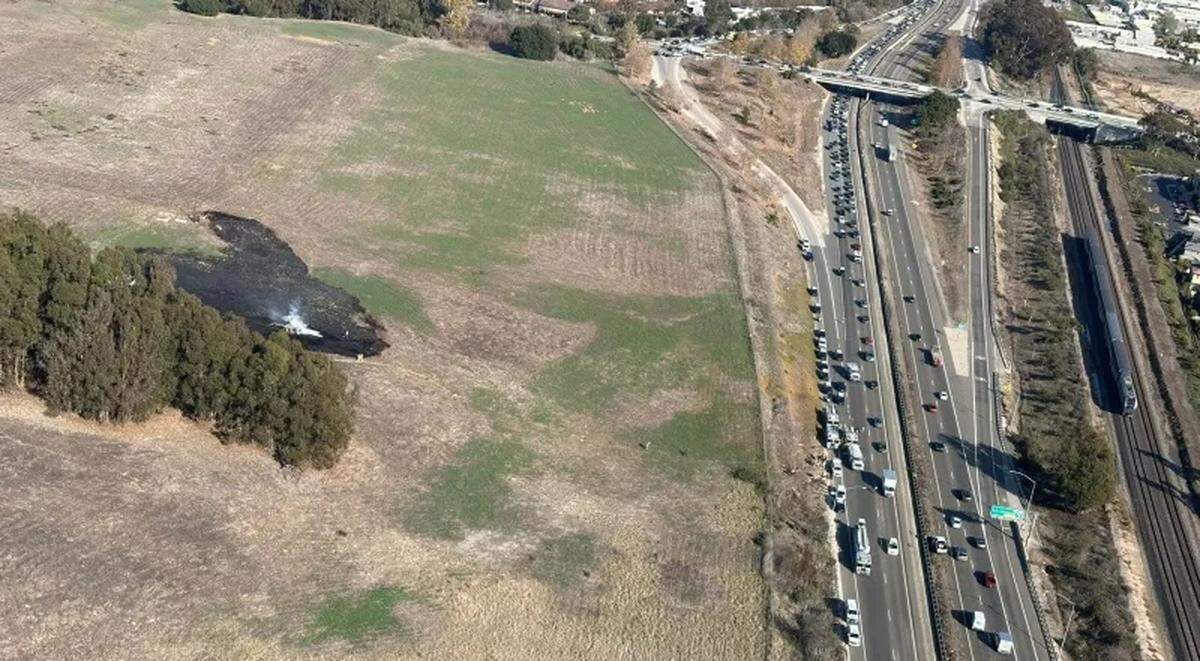 Two people were injured after a small plane crashed into a field and caught fire near Highway 101 in Goleta Wednesday afternoon, Jan. 29, 2025.