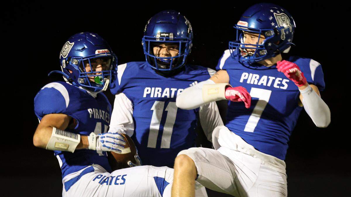 Celebrating a Pirate touchdown are from left Colton Janovec, Trevor Riddiough and James Nickel. Templeton beat Morro Bay 41-30 in a football game Oct. 11, 2024.