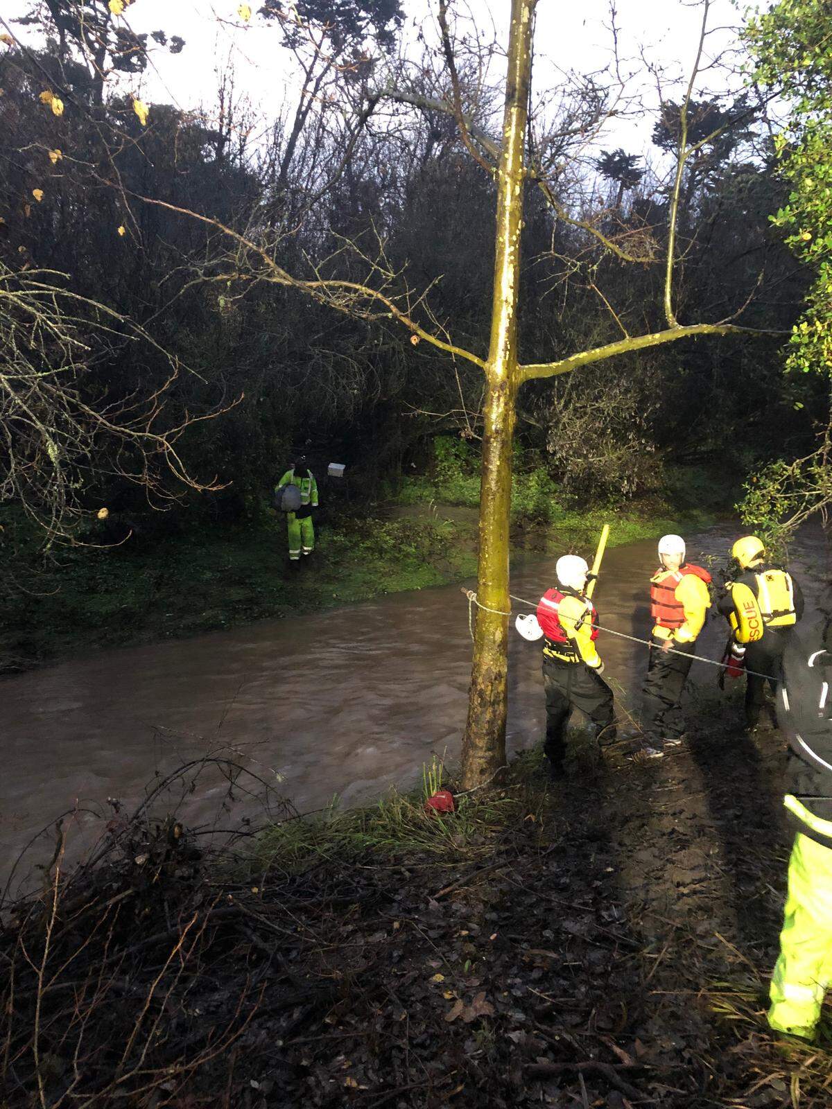 Firefighters from the San Luis Obispo Fire Department worked early Thursday morning to rescue a man who’d gotten stranded in the San Luis Obispo Creek bed due to heavy rains.