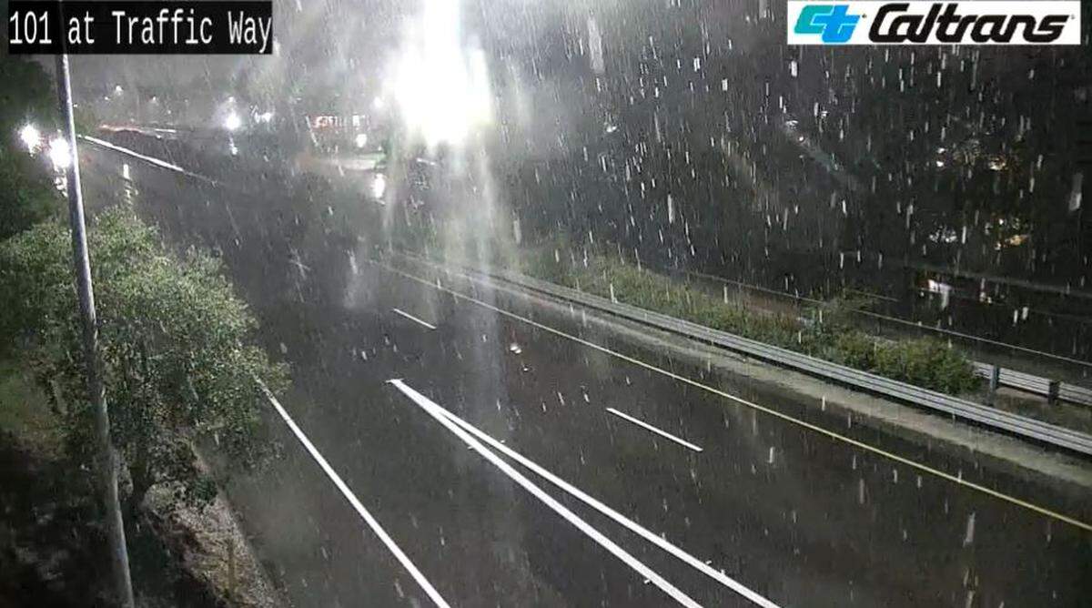 Caltrans traffic cameras captured snow falling along Highway 101 in northern San Luis Obispo County on Feb. 24, 2023. Here the camera shows the view at Traffic Way in Atascadero