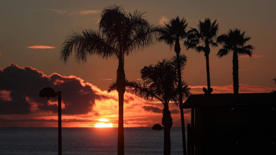 The sun sets over the Pacific Ocean as a storm clears out Wednesday, Nov. 29, 2023, in a view from the Kon Tiki Inn in Pismo Beach.