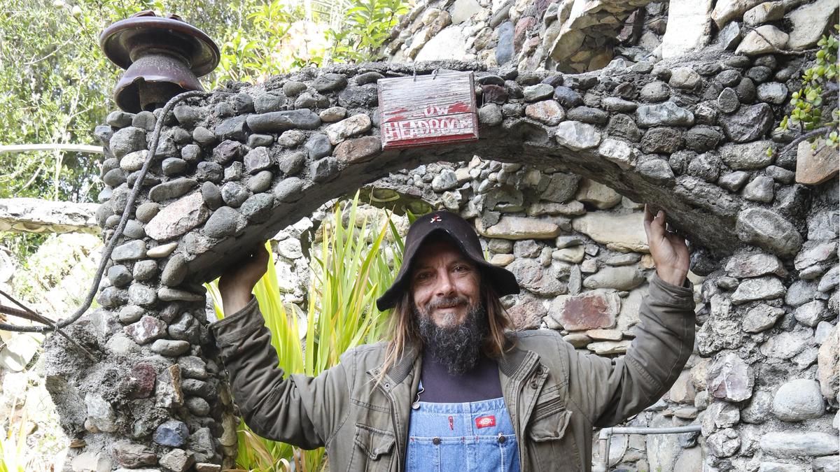 Michael O’Malley, owner of Nitt Witt Ridge in Cambria, offered insights into Art Beal, the home’s builder and designer, during a walk-through in 2018.