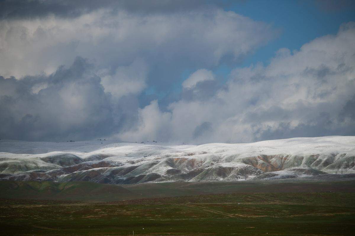 A first dusting of snow turned the Temblor Range white on Wednesday, Feb. 22, 2023, near the Carrizo Plain as a cold winter storm moves into California.