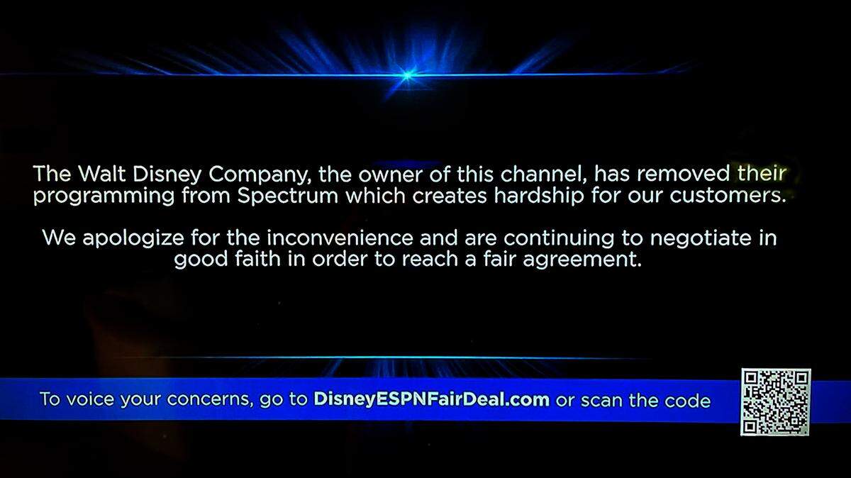 A rotating message on ESPN alerts Spectrum cable TV customers about the license fee dispute that has resulted in Walt Disney Co. channels going dark.