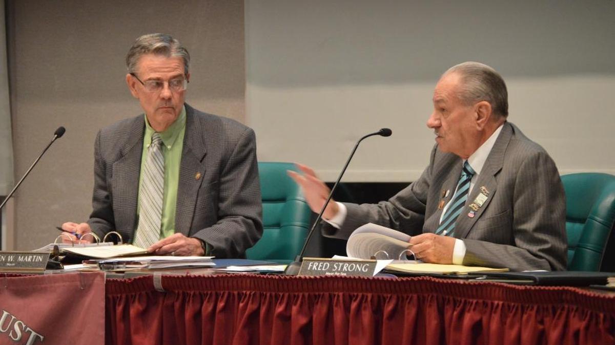 Paso Robles Mayor Steven Martin and Councilman Fred Strong discuss a ban on medical marijuana cultivation within city limits at the council meeting on Jan. 5.