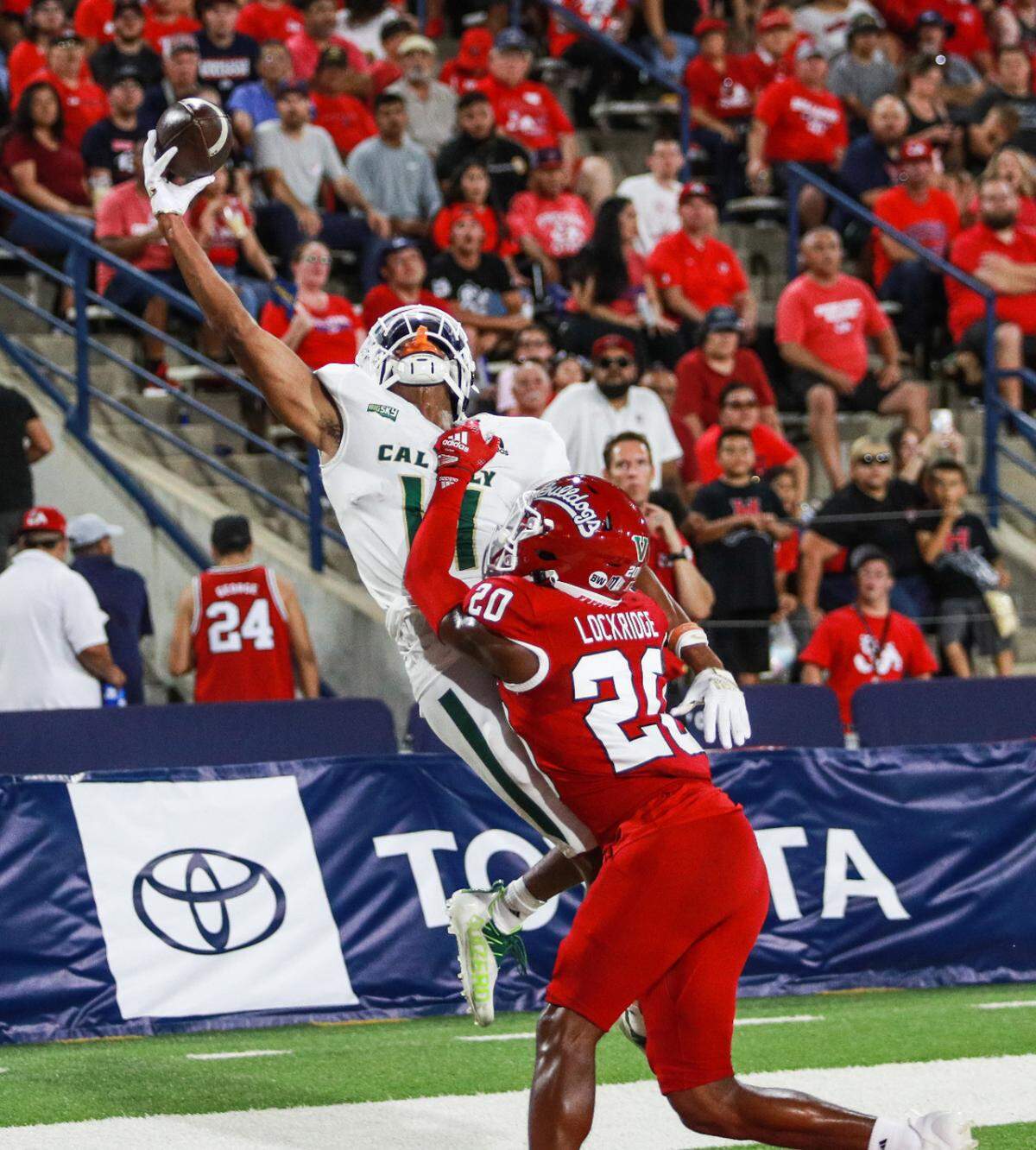 Bryson Allen tries to haul in a pass from Jaden Jones during Cal Poly’s 35-7 loss to Fresno State on Thursday, Sept. 1, 2022.