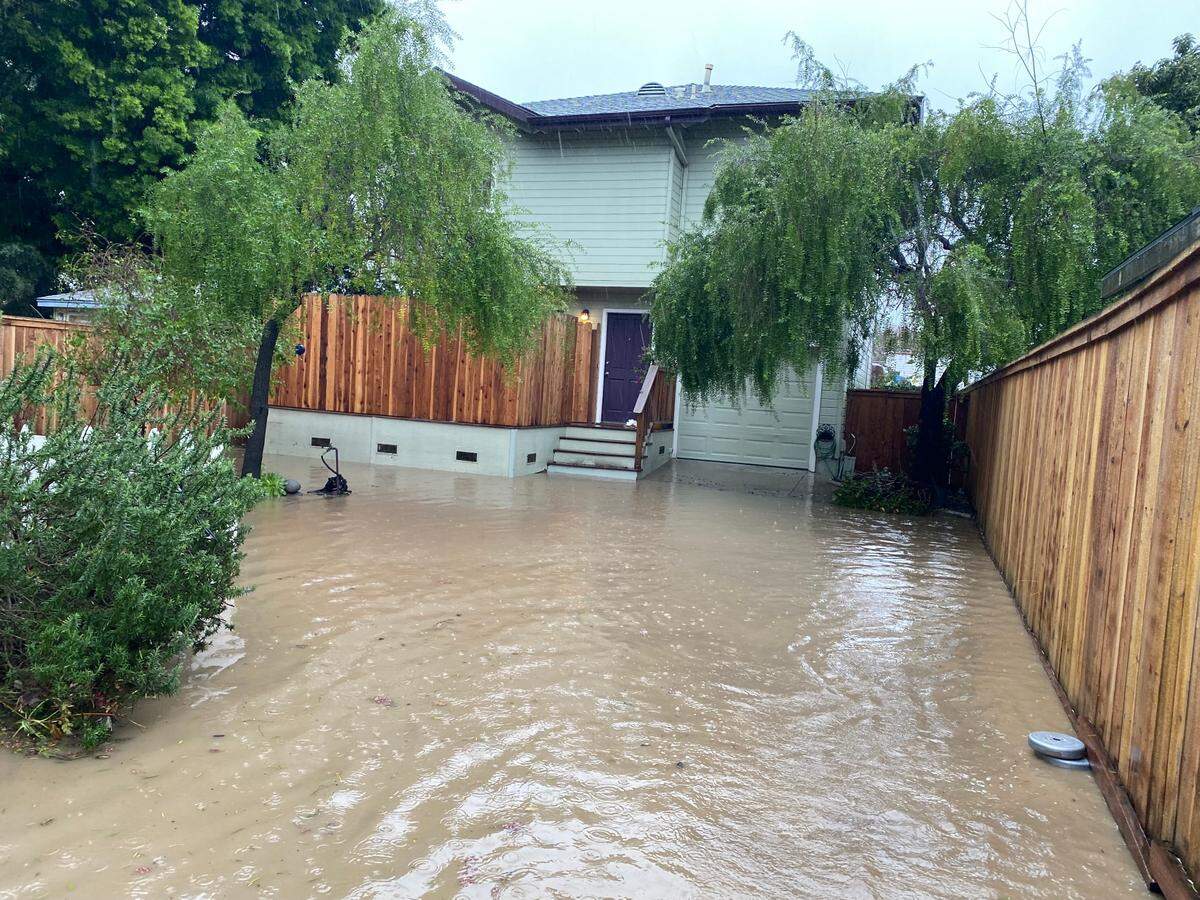 San Luis Obispo resident Kym Bartley’s backyard flooded on Jan. 9 2023.