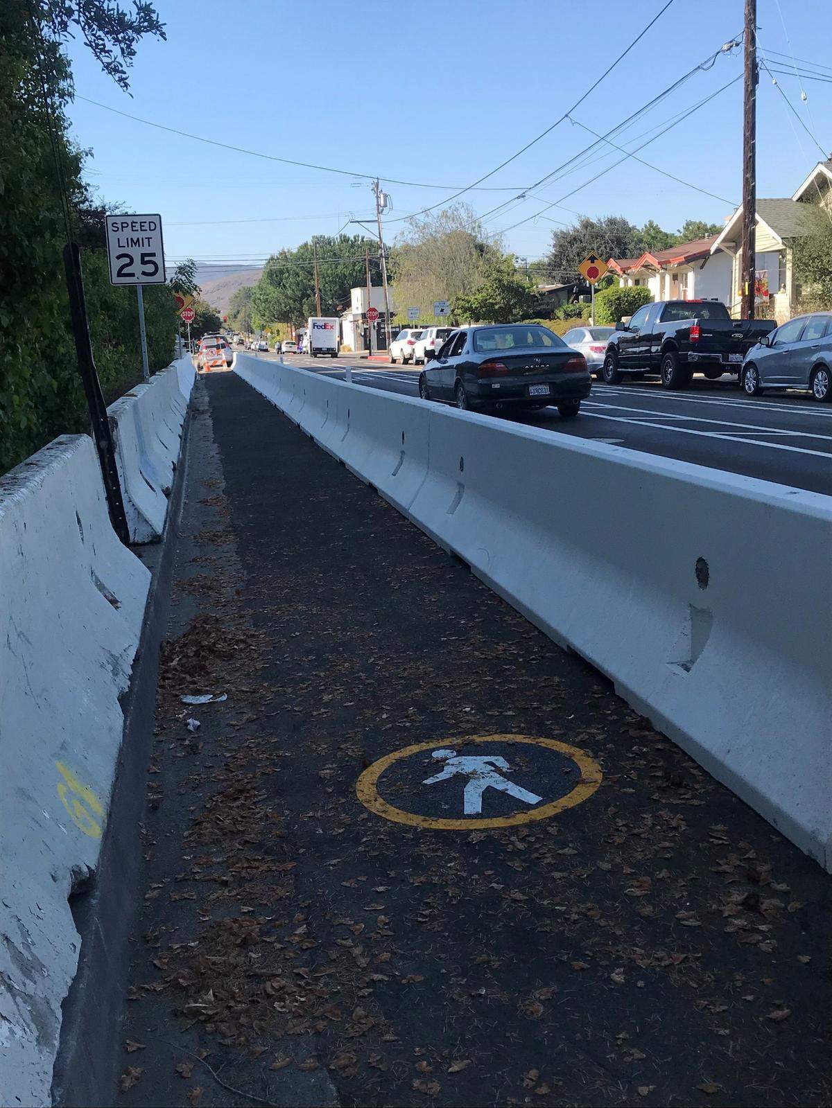 A before shot of the Pismo Street Pedestrian Trail.