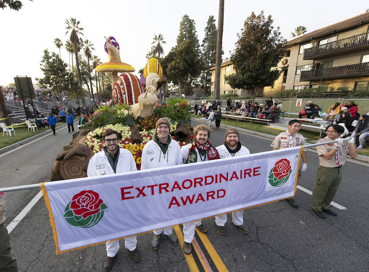 The Cal Poly Universities Rose Float, “Road to Reclamation,” makes its way down Colorado Blvd in Pasadena on Jan. 2, 2023. The float won the Extraordinaire Award. The float featured animated snails, gigantic toadstools and other marvels of the natural world that can be found on the forest floor