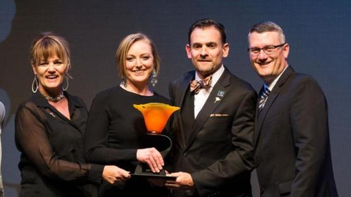 Representatives from Visit SLO CAL accept the Visit California’s Poppy Award for Best Digital Marketing Campaign.