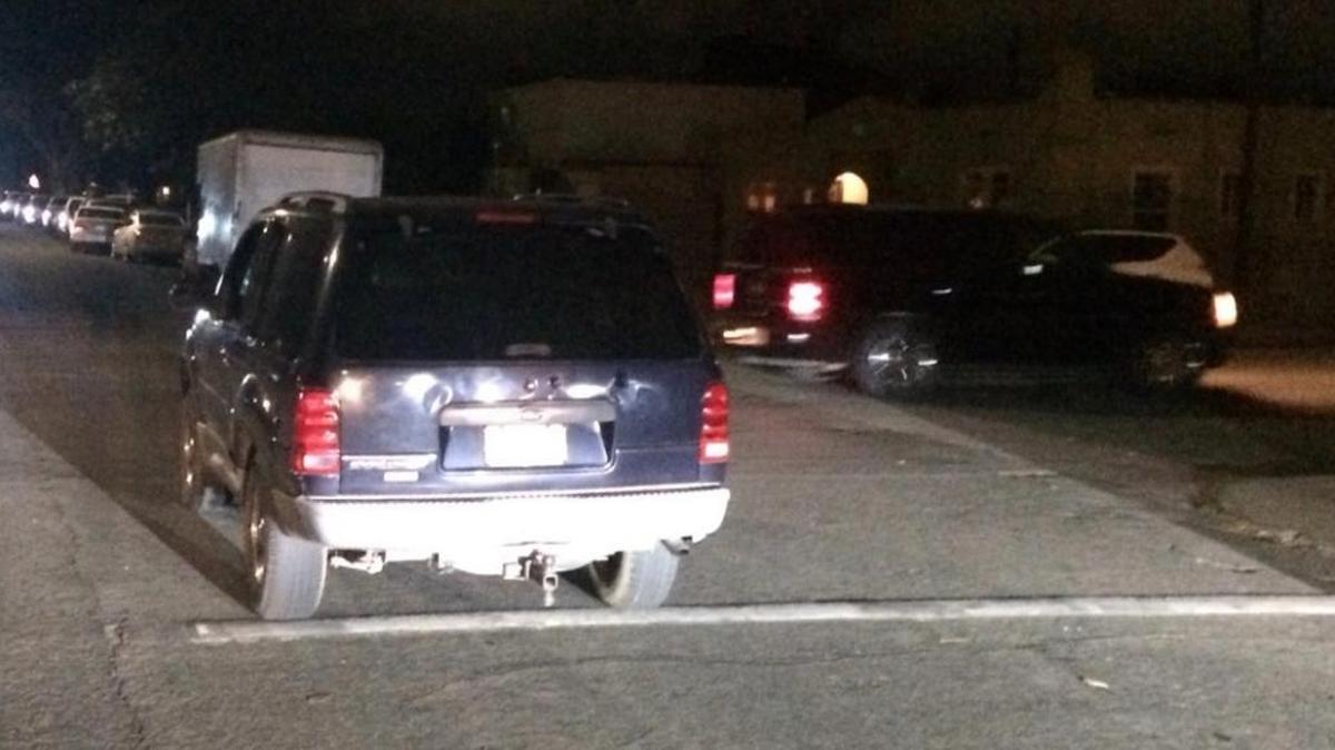 An SUV used in an hourlong police pursuit in and around Santa Maria sits in the intersection of the 800 block of West Tunnell Street. The suspect driving the vehicle was taken into custody and a 3-year-old child who was inside the entire time was rescued unharmed.