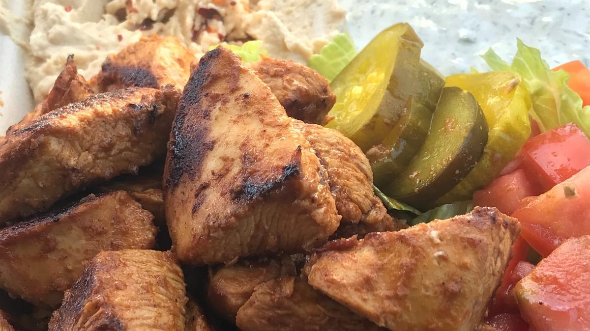 One of the most popular dishes offered by the Kabob House food truck in San Simeon is the grilled chicken kabob plate, complete with ultra-smooth housemade hummus and more.