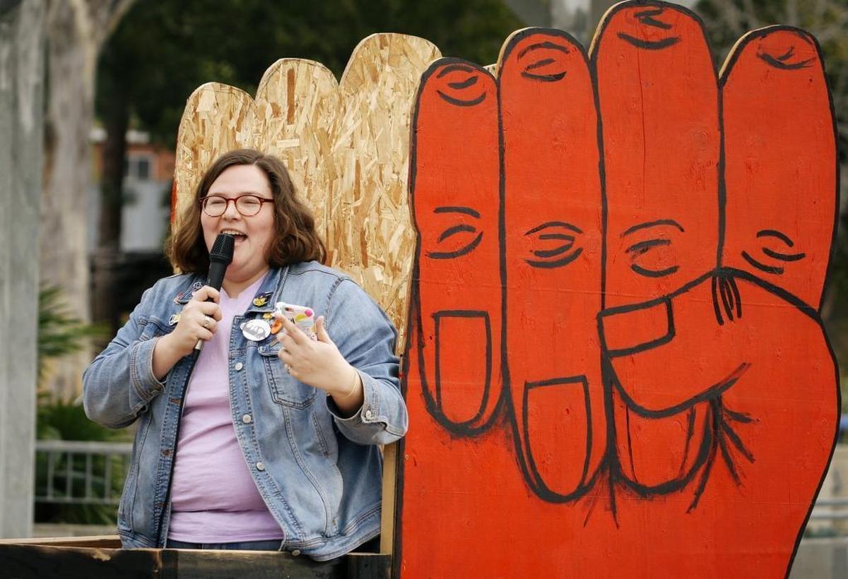 Katie Ettl speaks before she and about 60 students marched through the Cal Poly campus in support of sexual assault survivors and against rape culture Tuesday, January 16, 2018.
