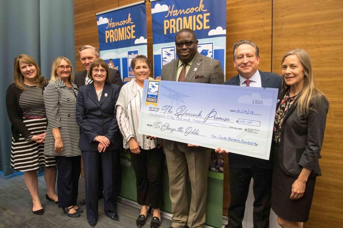 Presenting a $250,000 check are, from left: Barbara Andersen, chief strategy officer with the Santa Barbara Foundation; Lynette Muscio, director of development with the Santa Barbara Foundation; Hancock Superintendent/President Kevin G. Walthers; Kathy Simas, North County director of the Santa Barbara Foundation; Diane Adam, Santa Barbara Foundation board chair; Guy Walker; chair of The Hancock Promise Fund; Ron Gallo, president and CEO of the Santa Barbara Foundation; and Sharyn Main, senior director of community investments for the Santa Barbara Foundation.