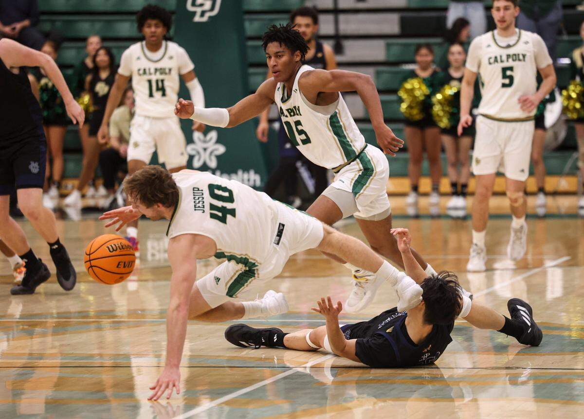 Isaac Jessup grabs a loose ball initiating a Cal Poly fast break. Irvine beat Cal Poly 98-82 in an overtime men’s baskeball game Jan. 2, 2025.