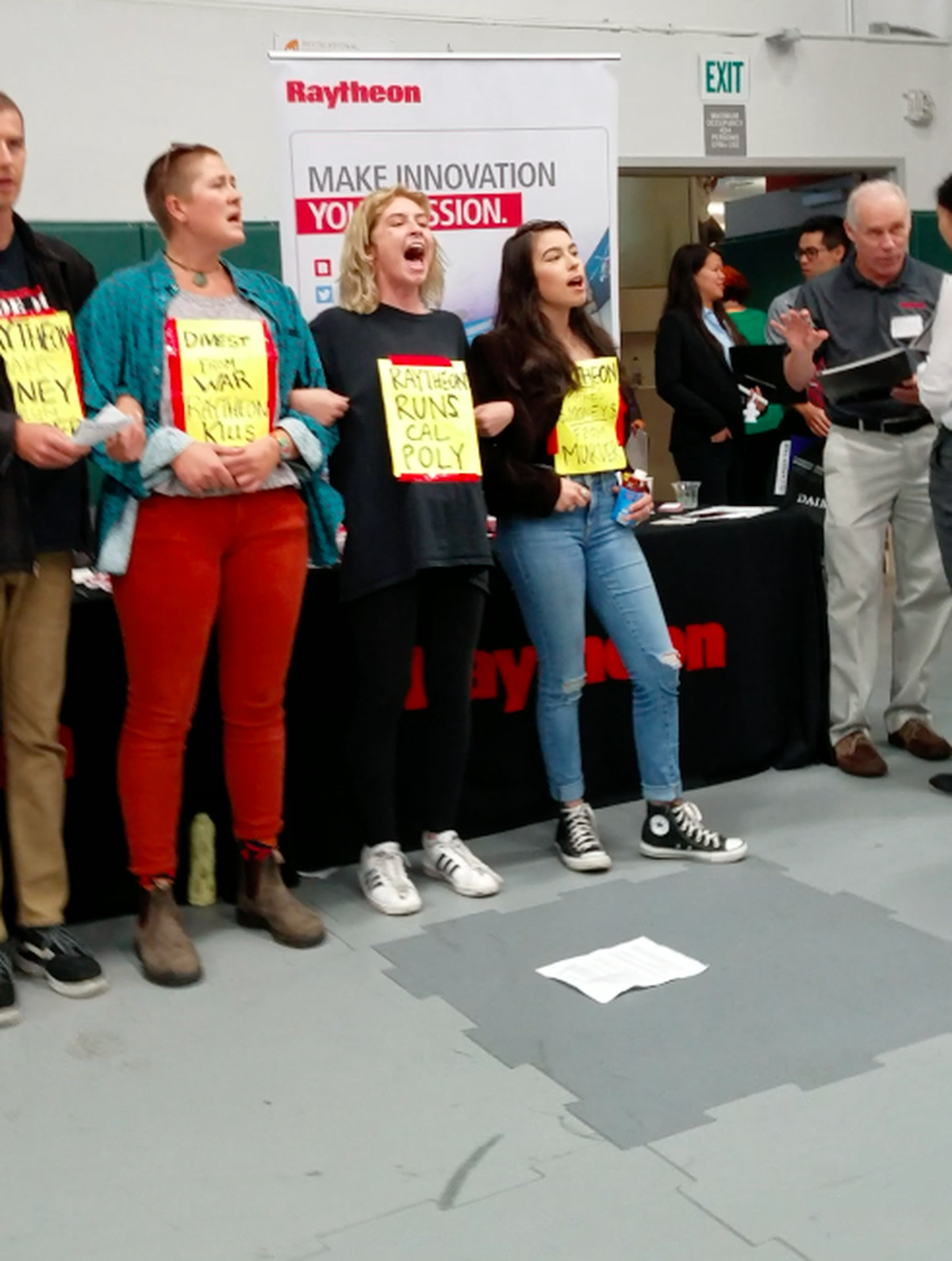 On Oct. 4, five Cal Poly students protested Raytheon’s ties to the university as a military defense contractor that has contributed to warfare.
