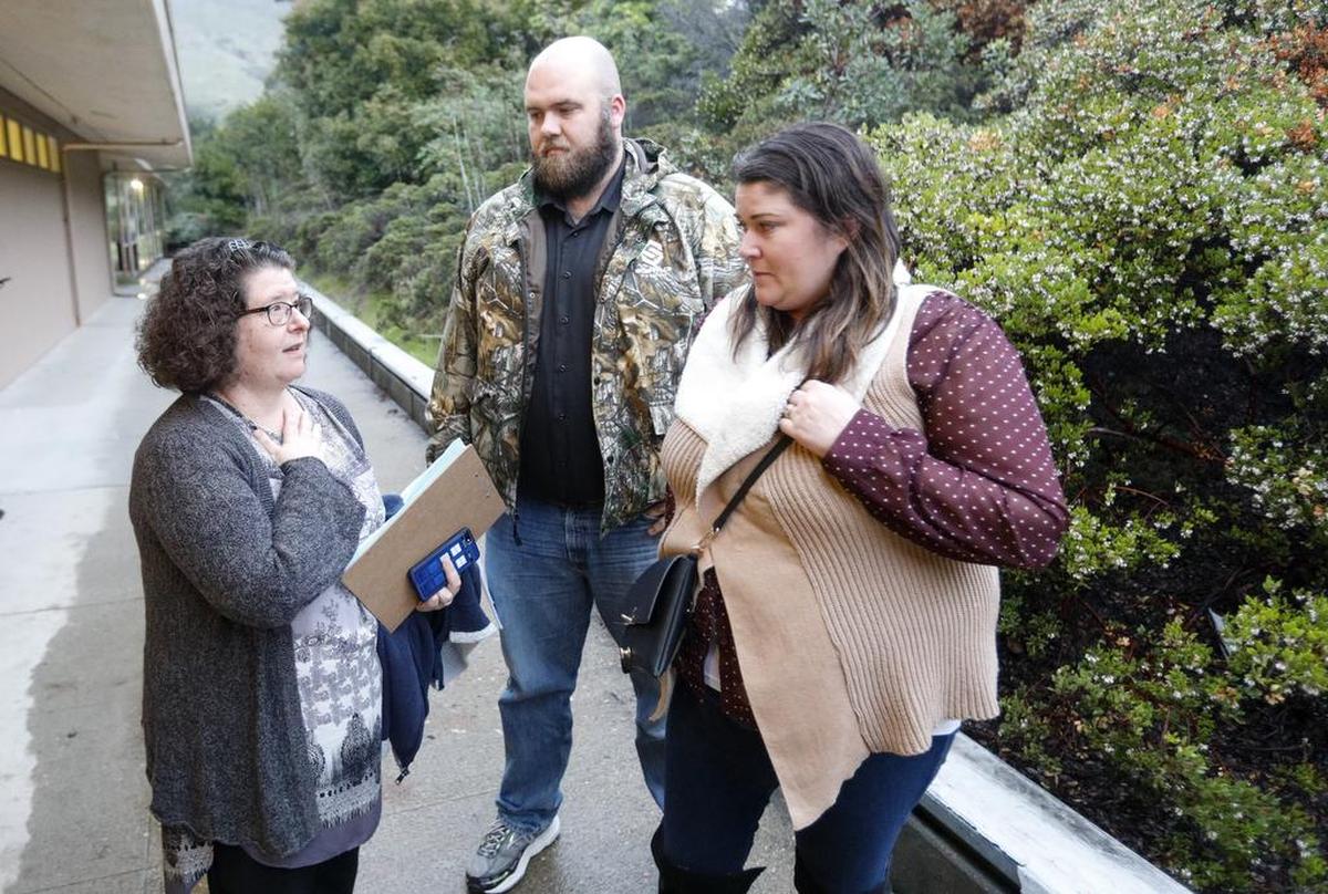 Michelle Call, left, talks to Mike and Holly Holliday after public comment at Tuesday’s San Luis Coastal school board meeting. Several people showed up to address the board during public comment on the issue of bullying.