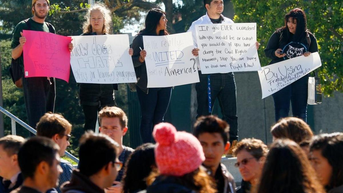 Cal Poly students protest the appearance of hate speech on a “Free Speech Wall” erected on the Dexter Lawn in November.