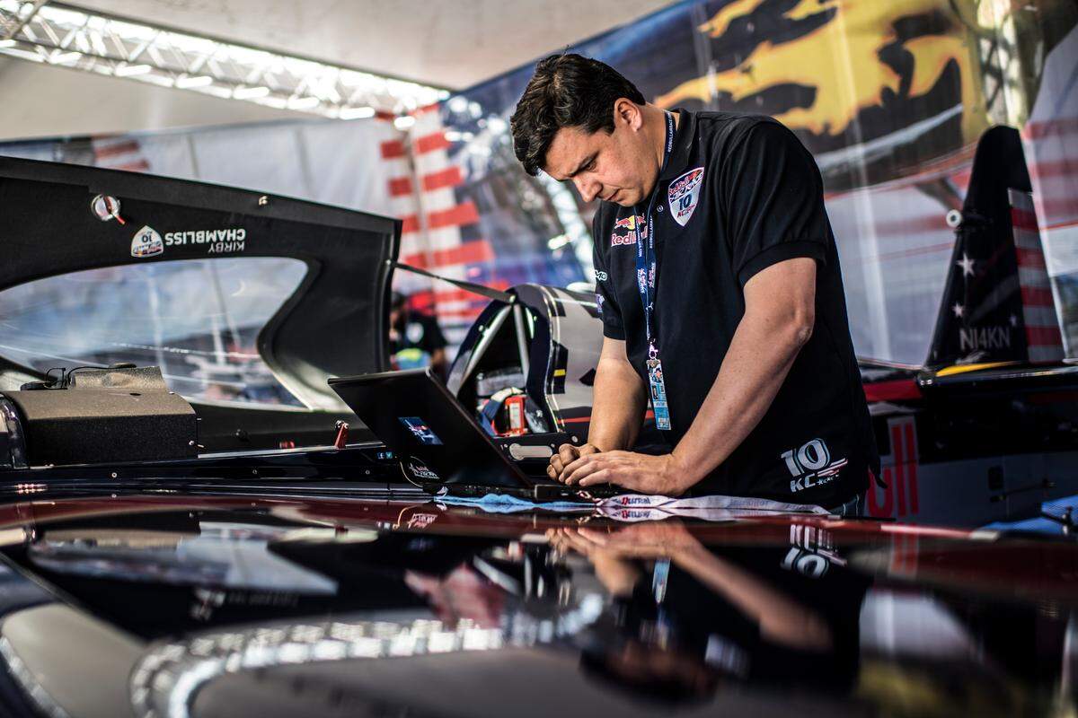 Cal Poly professor Paulo Iscold works during the training at the second stage of the Red Bull Air Race World Championship in San Diego on April 14, 2017.