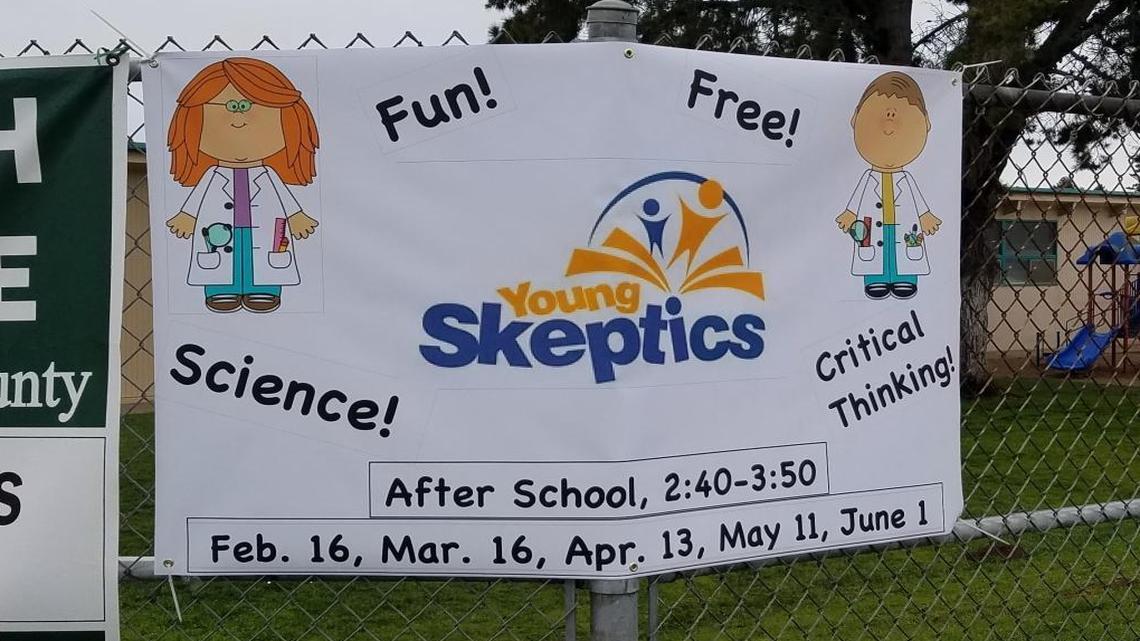 A sign at Harloe Elementary School inviting students to the Young Skeptics after-school club.