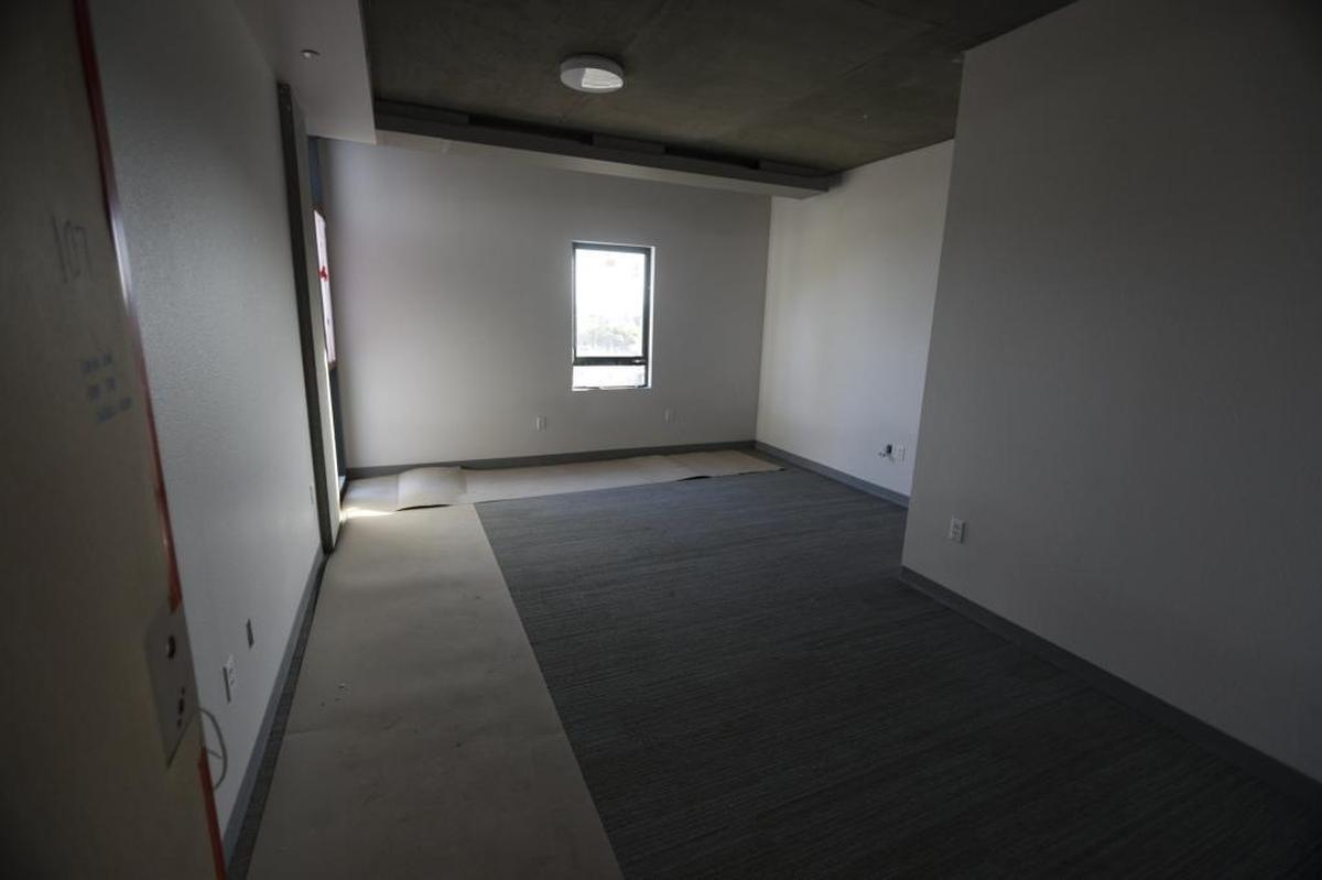 A dorm room nears completion in Cal Poly’s new student housing community under construction on Grand Avenue.