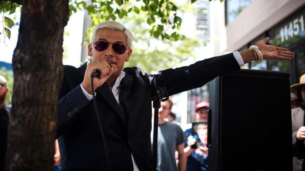 Milo Yiannopoulos, the Breitbart writer and “alt-right” personality, speaks with reporters at the Republican National Convention in Cleveland, July 19.