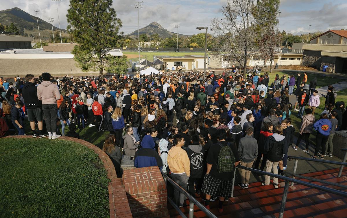 Hundreds of students walk out of class at San Luis Obispo High School on Wednesday as part of the National Walkout for Gun Safety.