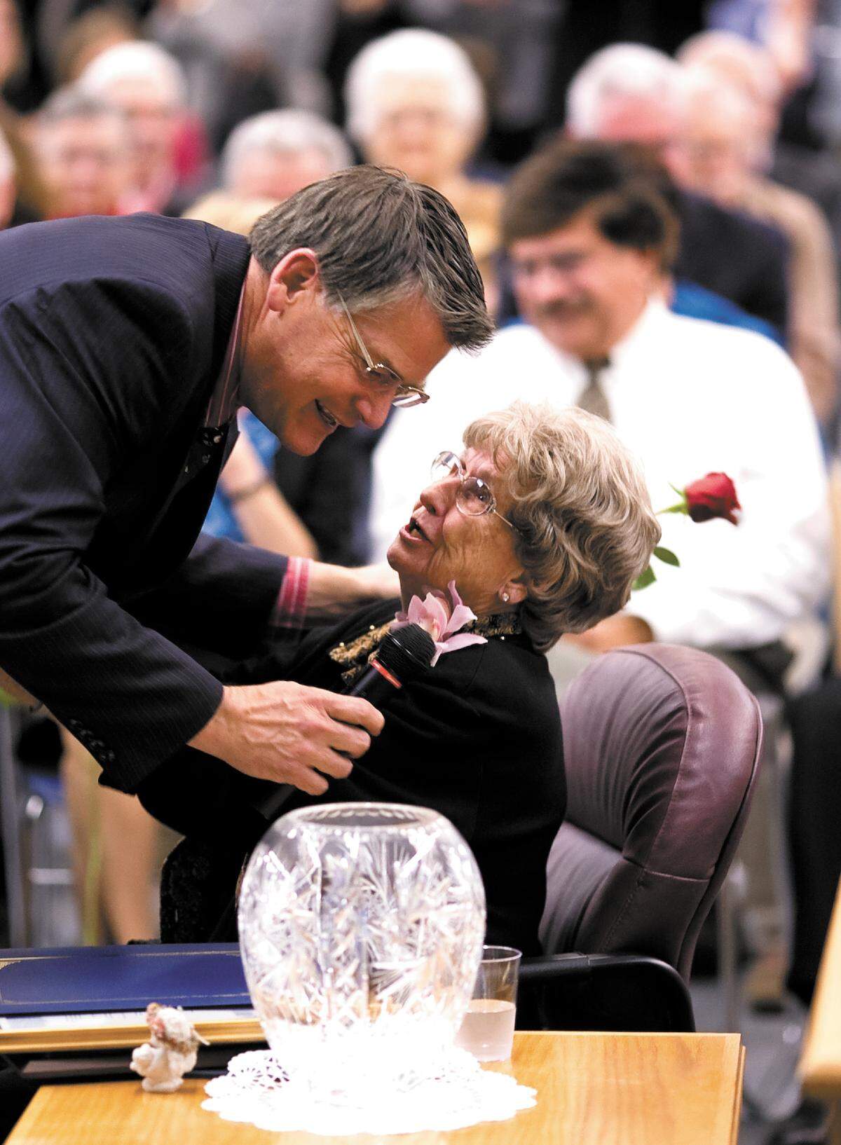 Longtime Lucia Mar Unified School District board member Georgie O’Connor hugs a supporter during her last school board meeting in 2010. O’Connor died July 8, 2018, at age 95.