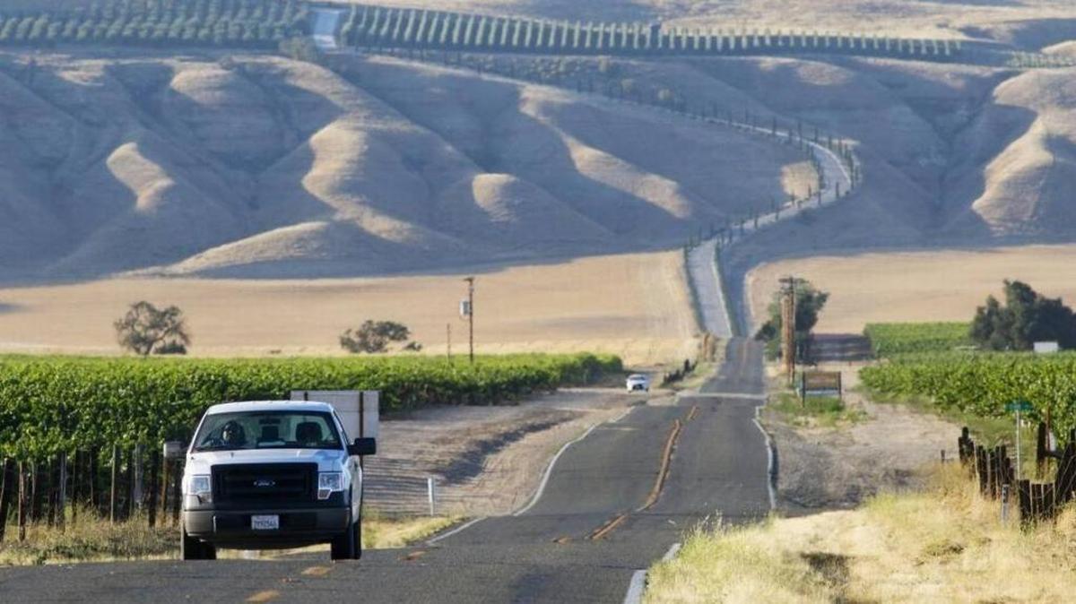 Shadows throw the hills in sharp relief rising above Highway 41 south of Shandon. Residents can once again use their water without boiling it first.