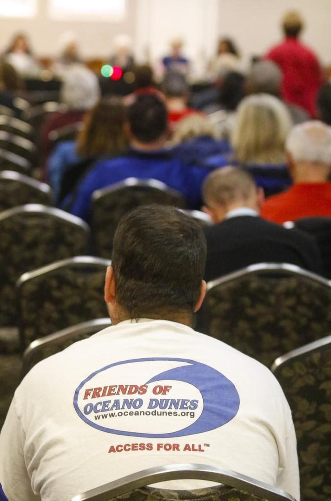 Off-road supporters wore blue shirts or white shirts with logos to the Coastal Commission’s Wednesday meeting on State Parks’ dust control efforts at Oceano Dunes State Vehicular Recreation Area.