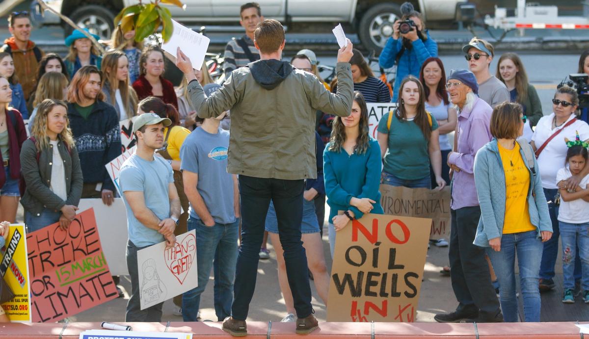 Cal Poly student Brandon O’Rourke speaks to the crowd at a Youth Climate Strike rally in San Luis Obispo on Friday, March 15, 2019. Students from Cal Poly, Cuesta College and local high schools walked out of class to rally for climate action.