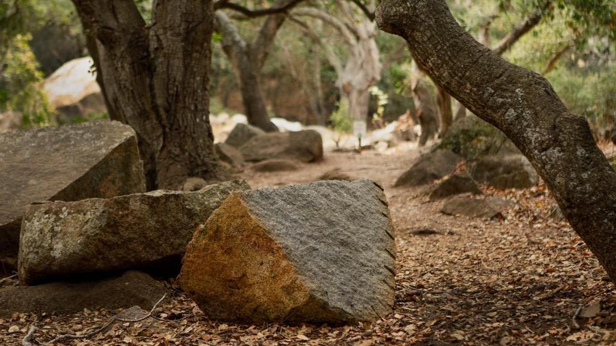 The rock painted like a slice of watermelon along the Bishop Peak trail near Highland Drive has been cleaned and returned to its natural look.