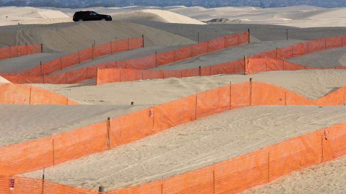 The Oceano Dunes State Vehicular Recreation Area is the only park in California where vehicles are allowed on the beach. Lines of snow fencing aim to slow winds and drop airborne sand to the ground before it can blow onto the Nipomo Mesa.