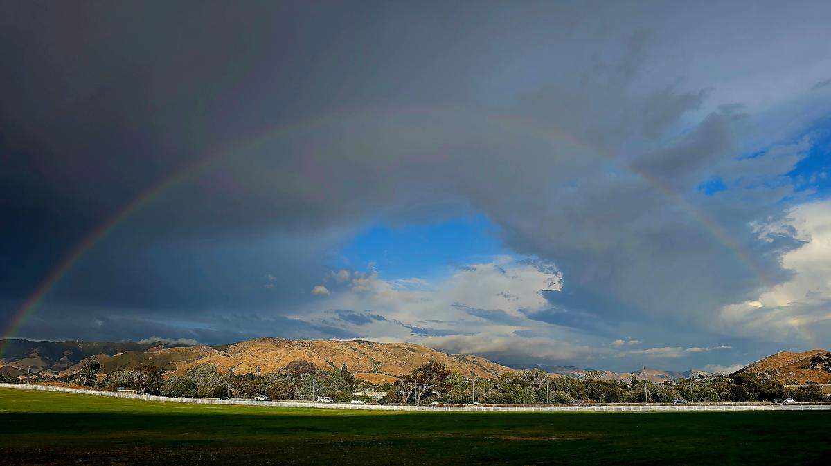 A full rainbow was visible from Madonna Inn in San Luis Obispo, California as sudden thunderstorms swept across San Luis Obispo County.