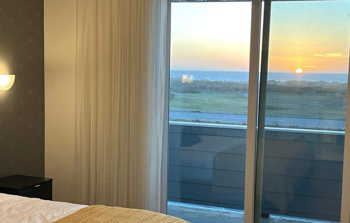 This is the sunset view from one of the upper level rooms in Morro Bay’s new boutique hotel, Rhapsody in View.