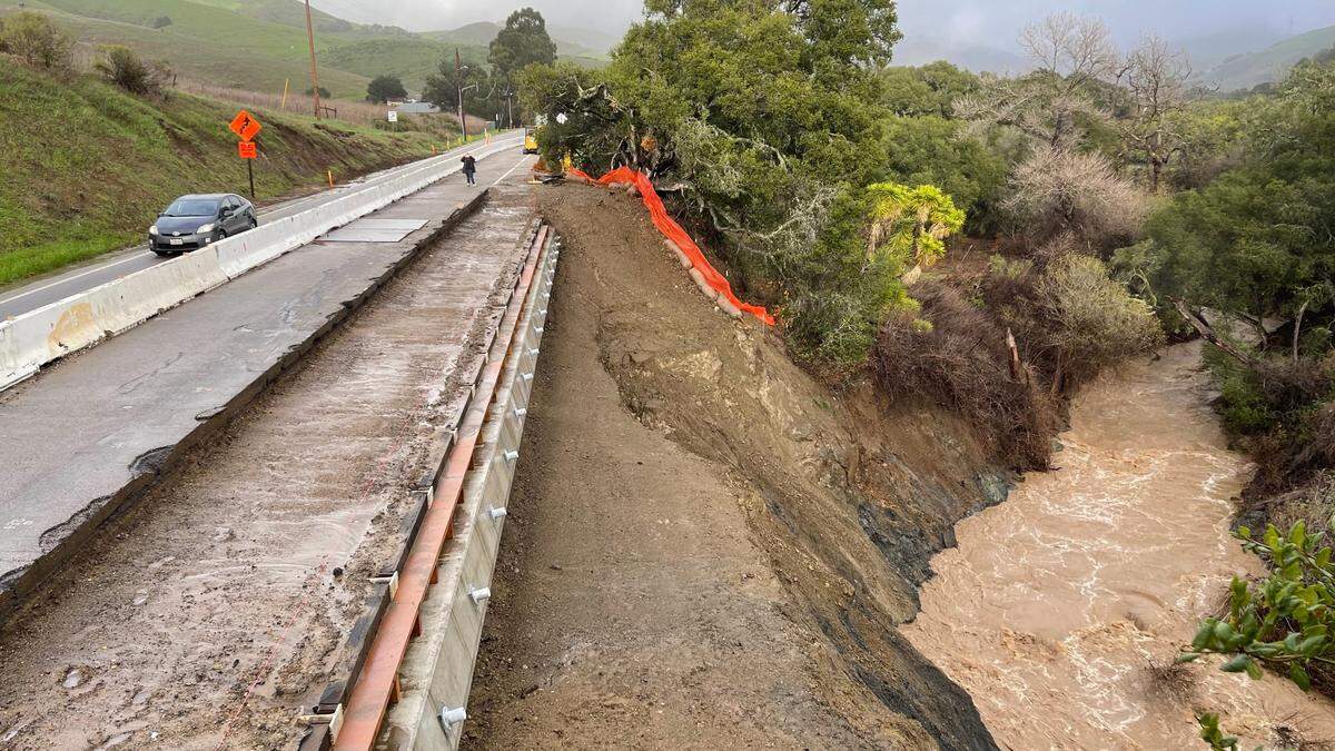 One lane has been closed on Highway 41 since September with a stoplight and alternating traffic while Caltrans works to repair the eroding embankment along a bend in Morro Creek.