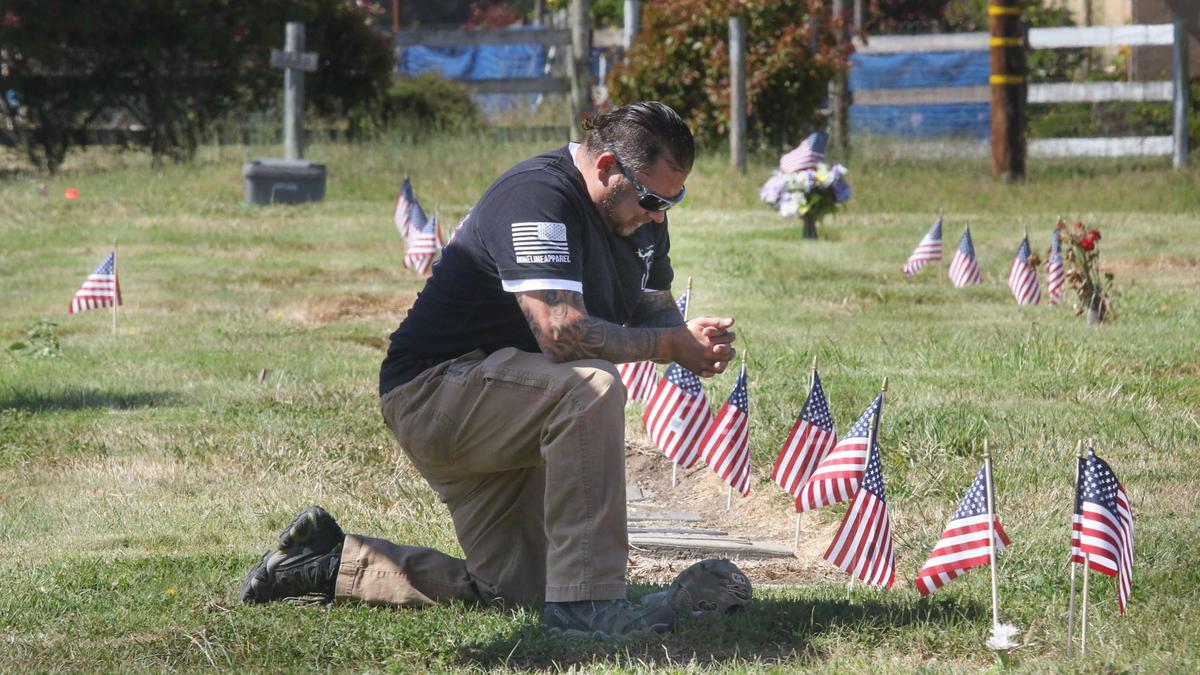 Ted Gray of Paso Robes payed his respects on Memorial Day at Los Osos Valley Mortuary and Memorial Park. 5-25-2020 David Middlecamp