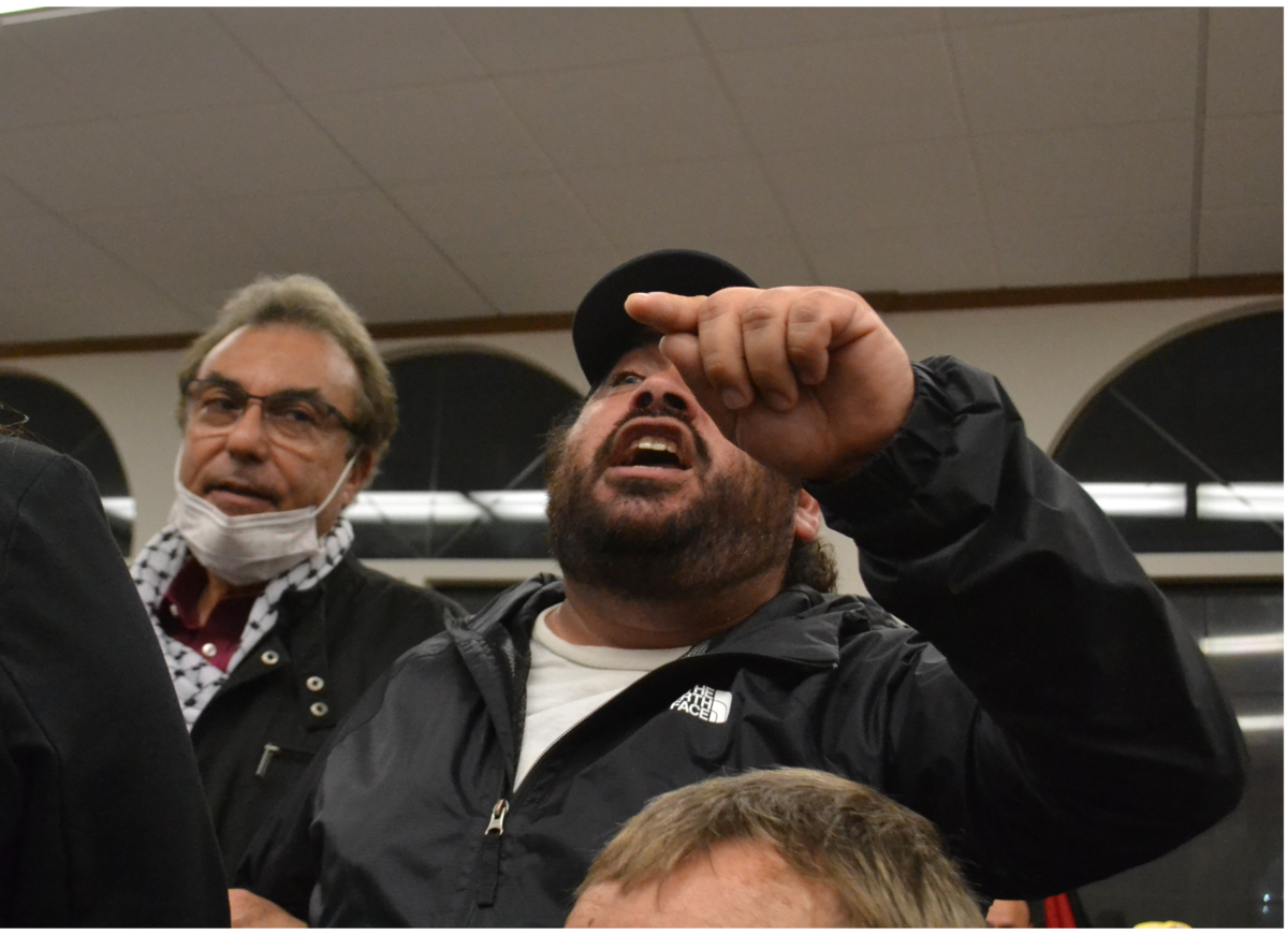 Goleta resident Omar Figuerodo stood up and shouted at Rep. Salud Carbajal to call for a ceasefire in Gaza at a town hall in Arroyo Grande on Monday, Jan. 22, 2024.