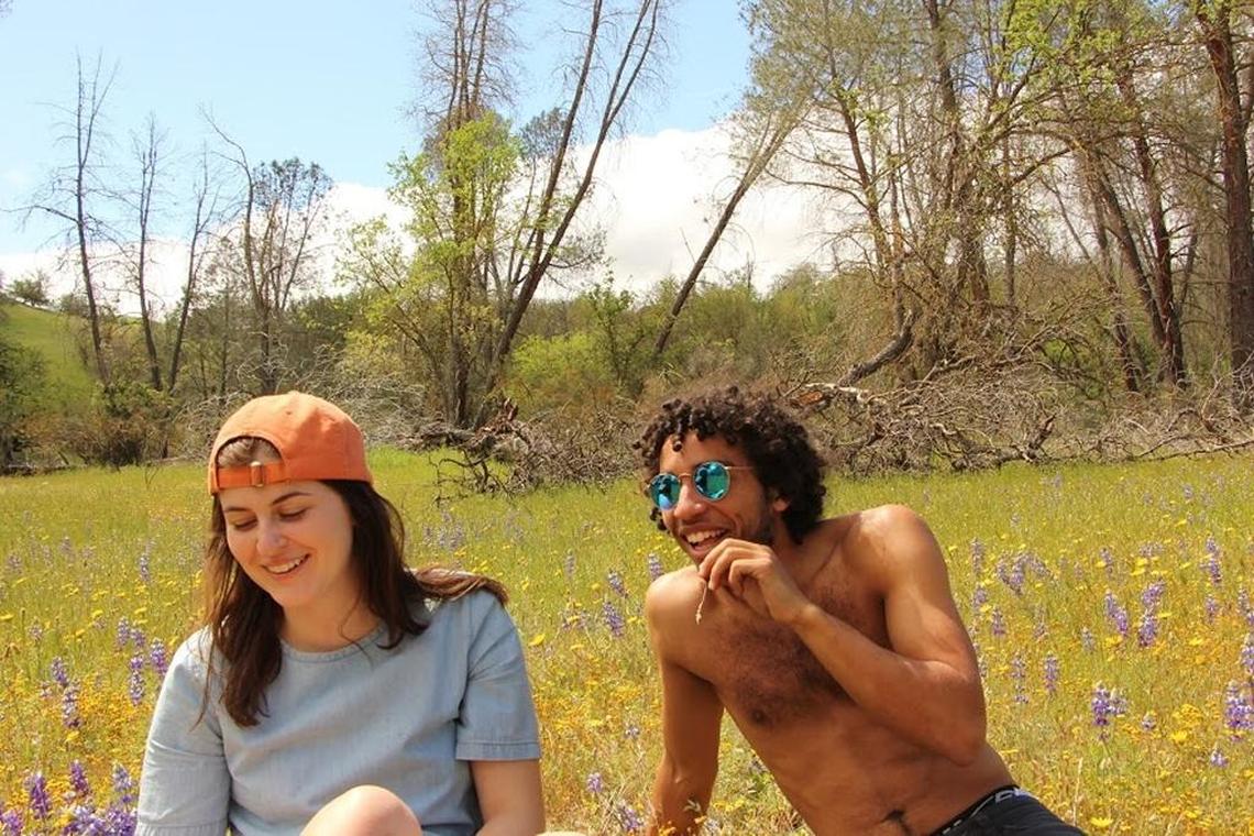 Kennedy Love smiles with his friend Sasha Shebalin amid the wildflowers of the Carrizo Plain superbloom.