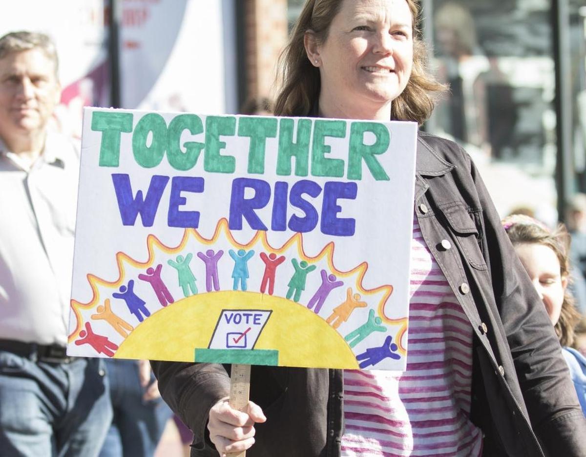 Signs from Saturday’s “Hear Our Vote: Voices of Resistance Rally.”