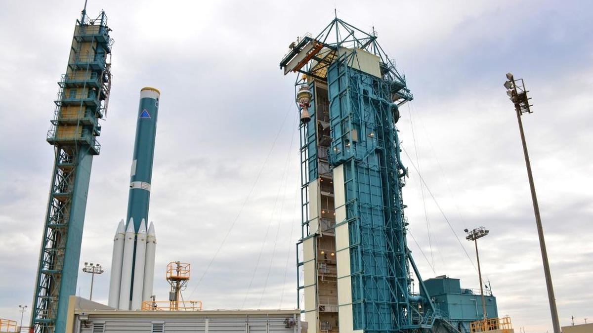 At Vandenberg Air Force Base earlier this year, a United Launch Alliance Delta II second stage is hoisted into the gantry at Space Launch Complex 2. It will be mounted atop the first stage of the rocket, seen on the left, as preparations continue for the launch of the Joint Polar Satellite System-1.