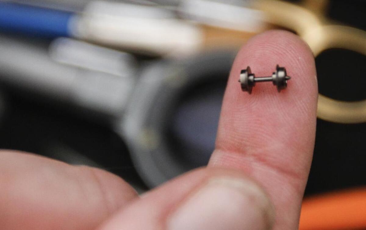 Wheels rest on Schumacher’s finger.