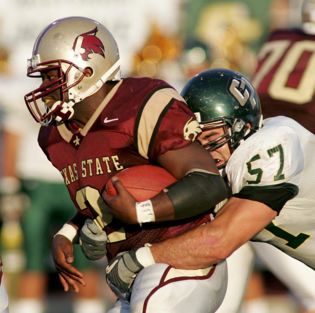 Matthew Chachere was a linebacker on the Cal Poly football team from 2001 to 2005. Here, he makes a tackle against Texas State on Dec. 3, 2005. The San Luis Obispo resident and his girlfriend, Jennifer Besser, died after apparently being hit by a car on Nov. 21, 2022.