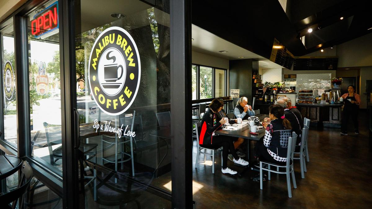 Customers enjoy drinks at Malibu Brew Coffee in Atascadero in 2019. Co-owner Paul Say has been diagnosed with cancer.