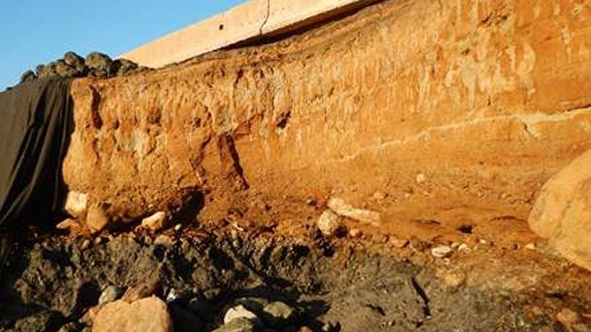 Waves have eroded the rock slope near Highway 1 north of the Piedras Blancas lighthouse.