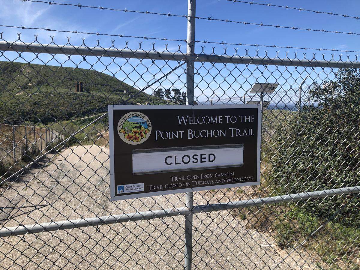 A sign posted at PG&E’s Point Buchon Trail shows the trail is closed.