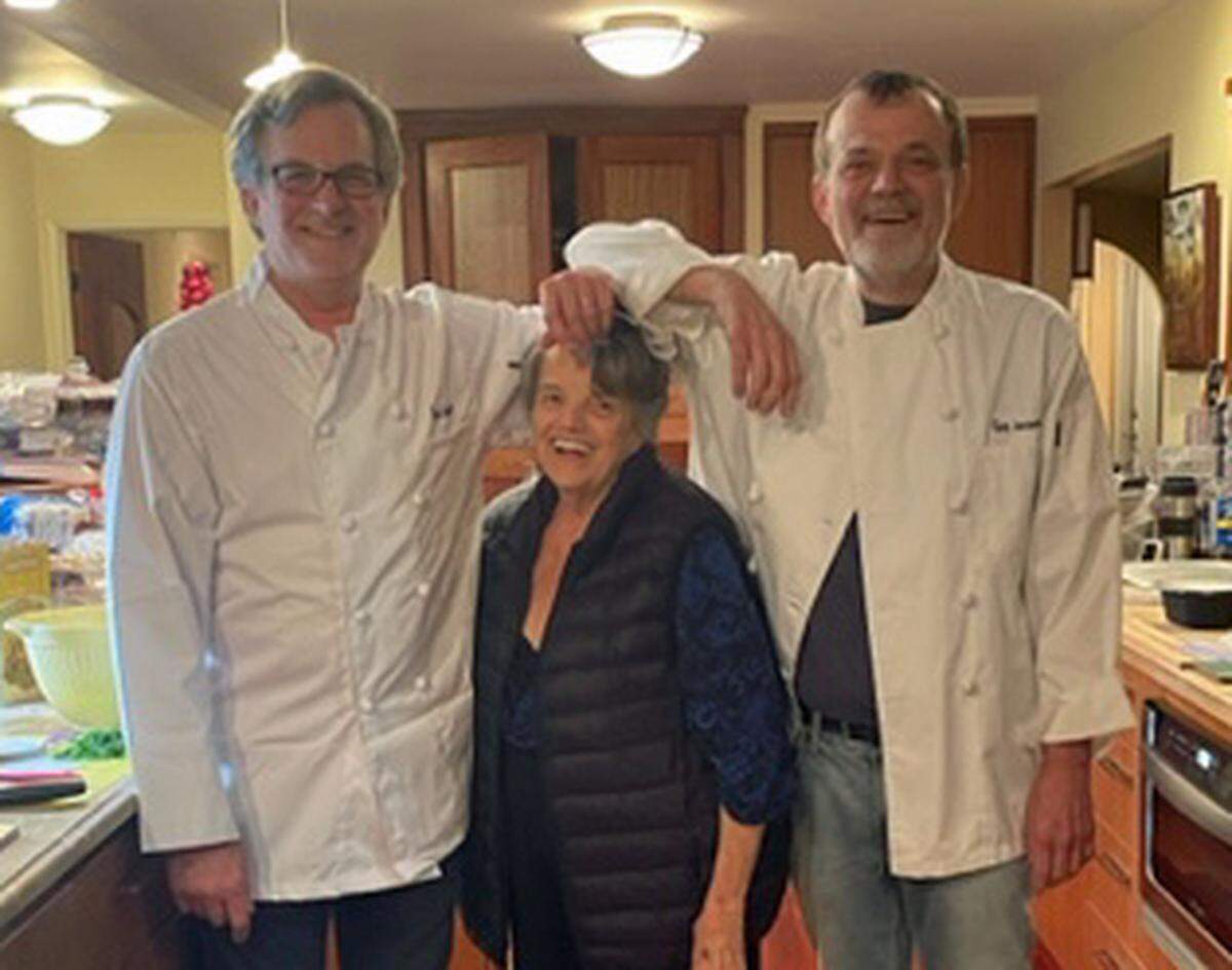 Tribune reporter Kathe Tanner with sons Brian Tanner, right, and Sean Tanner, in their classic chef pose.