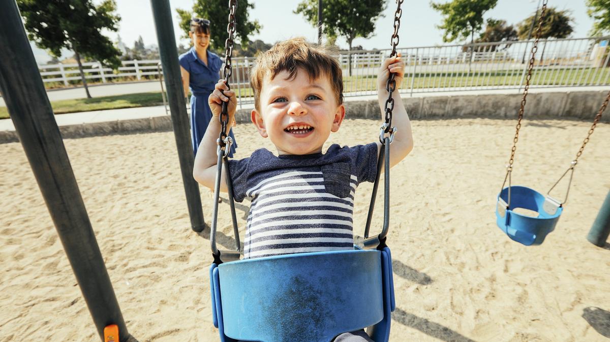 The author and her son enjoy the swings at Rancho Grande Park in Arroyo Grande.