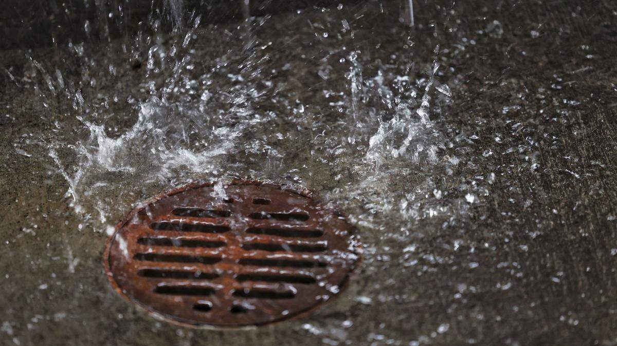 The National Weather Service issued a flood watch for San Luis Obispo County as a storm sweeps across the Central Coast and California. Water pools in a drain on Dec. 18, 2023.