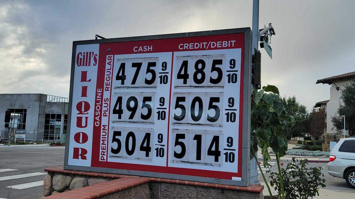 Gas prices have fallen below $5 a gallon at Gill’s Liquor in Arroyo Grande, on Dec. 6, 2022.